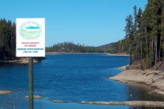 A sign intended to prevent camping on the South Dam at McCulloch Reservoir.